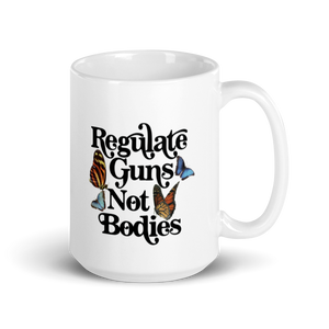 Regulate Guns Not Bodies Mug