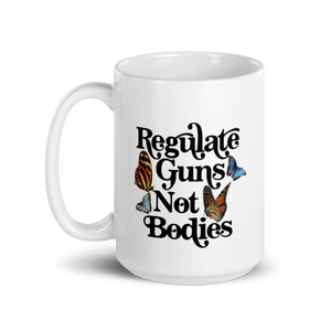 Regulate Guns Not Bodies Mug